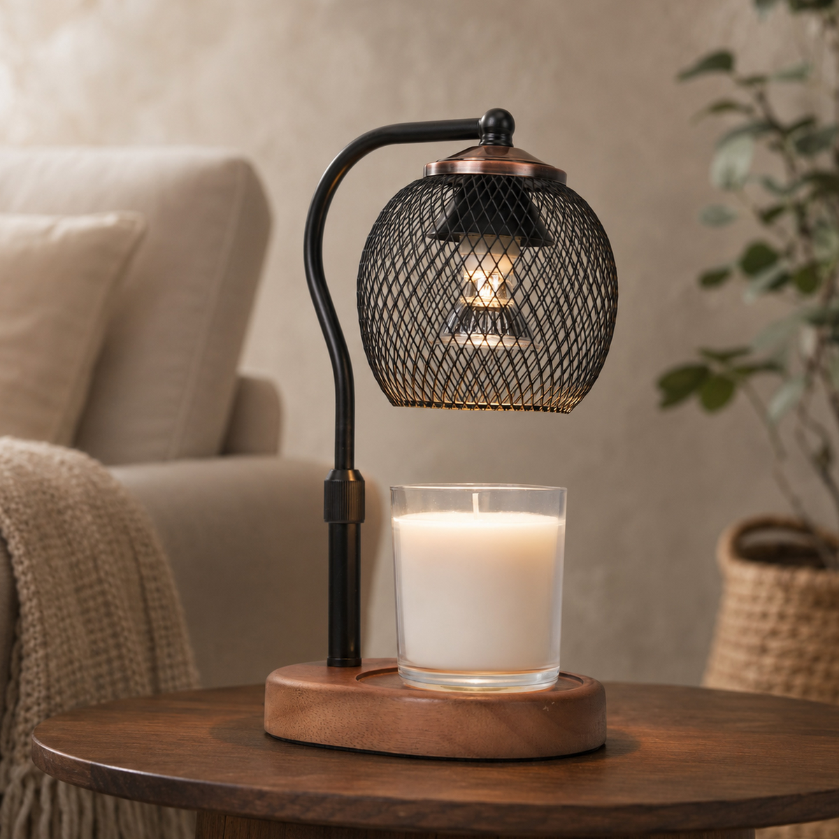 Lattice Orb candle warmer glowing over a white jar candle on a wooden side table beside a cream armchair.