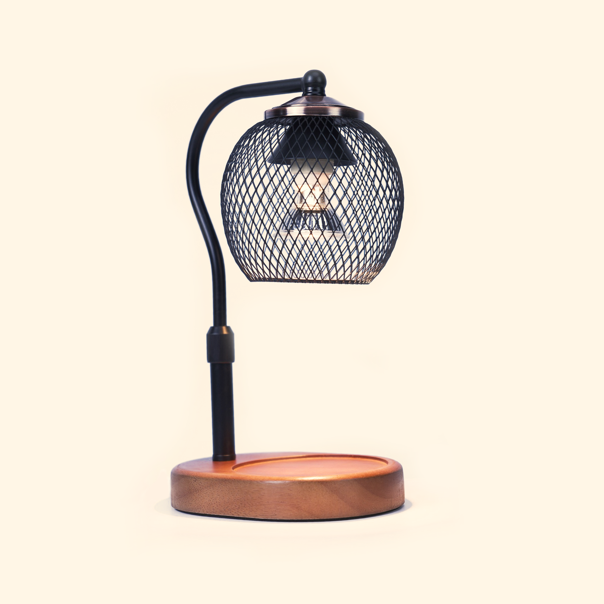Lattice Orb Candle Warmer Lamp with spherical black diamond mesh shade and warm wood base, front view.
