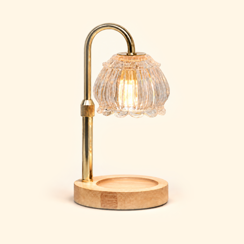 Clear fluted petal glass candle warmer lamp with natural wood base and gold arm, without candle