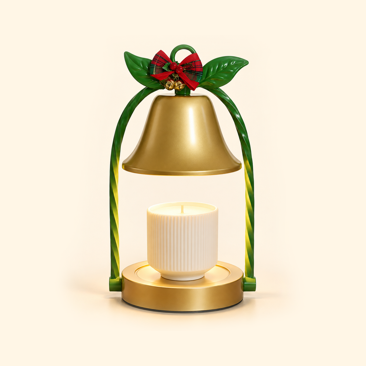 Gold bell-shaped candle warmer lamp with a green frame and red plaid bow, warming a candle in a white ribbed cup.