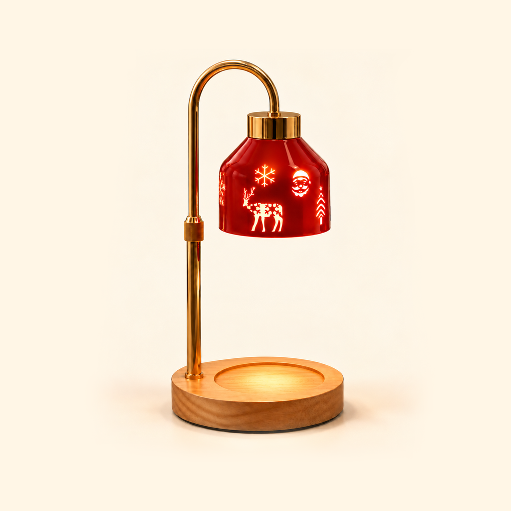 Illuminated red Christmas candle warmer lamp with a curved gold stand and an empty round wooden base on a cream background.