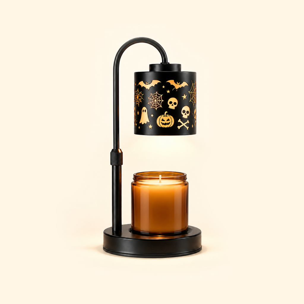Halloween icon candle warmer lamp warming an unlabeled amber jar candle on a cream background