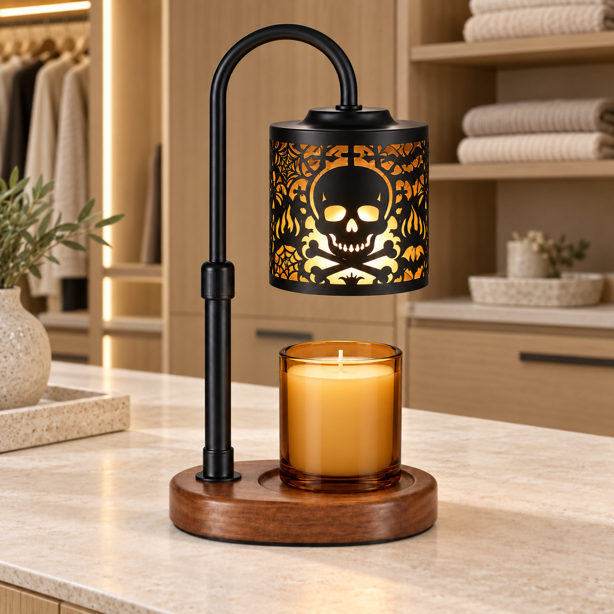 Skull and crossbones candle warmer lamp displayed on a walk-in wardrobe island