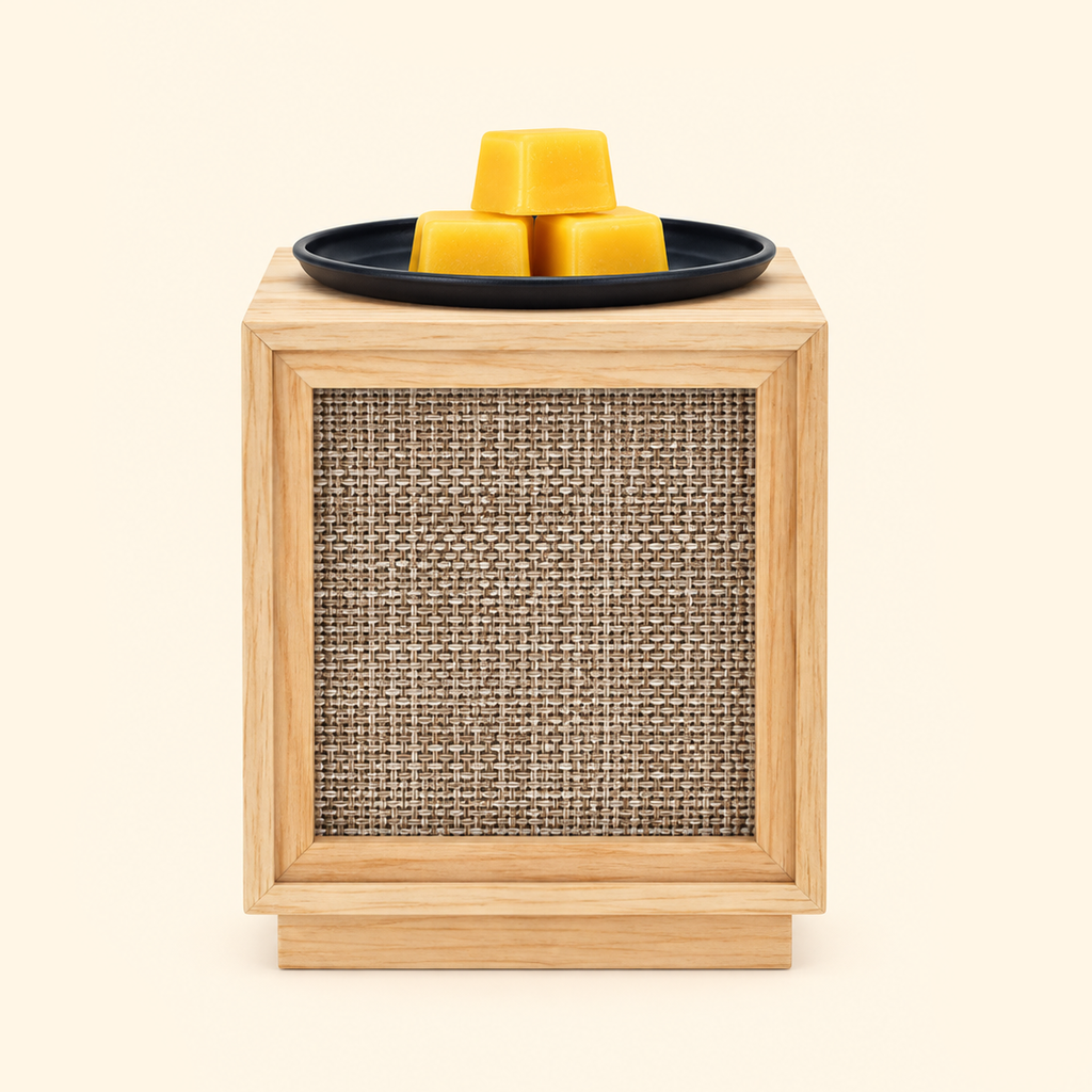 Unlit Natural Weave Wooden Illumination Wax Warmer with woven front panel and yellow wax melts, front view.