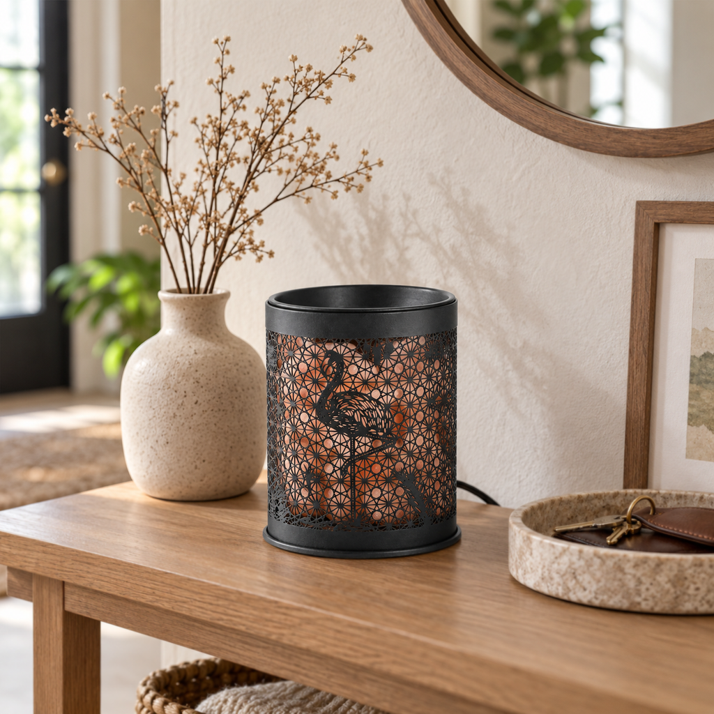 Flamingo Salt Glow Wax Warmer displayed unlit on an oak entryway console in natural daylight