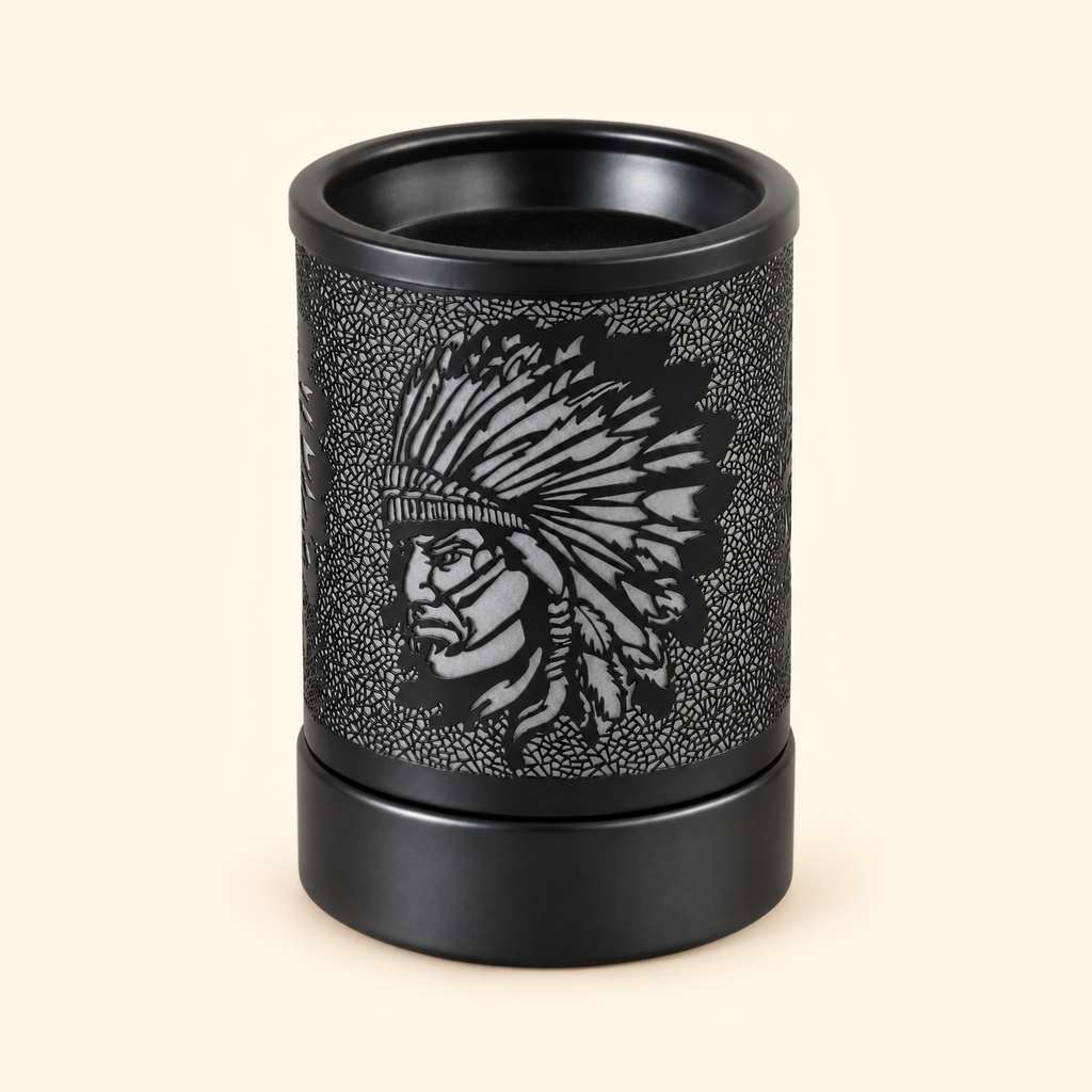 Unlit black electric wax warmer with a feathered headdress profile and intricate crackle-cut metal design.