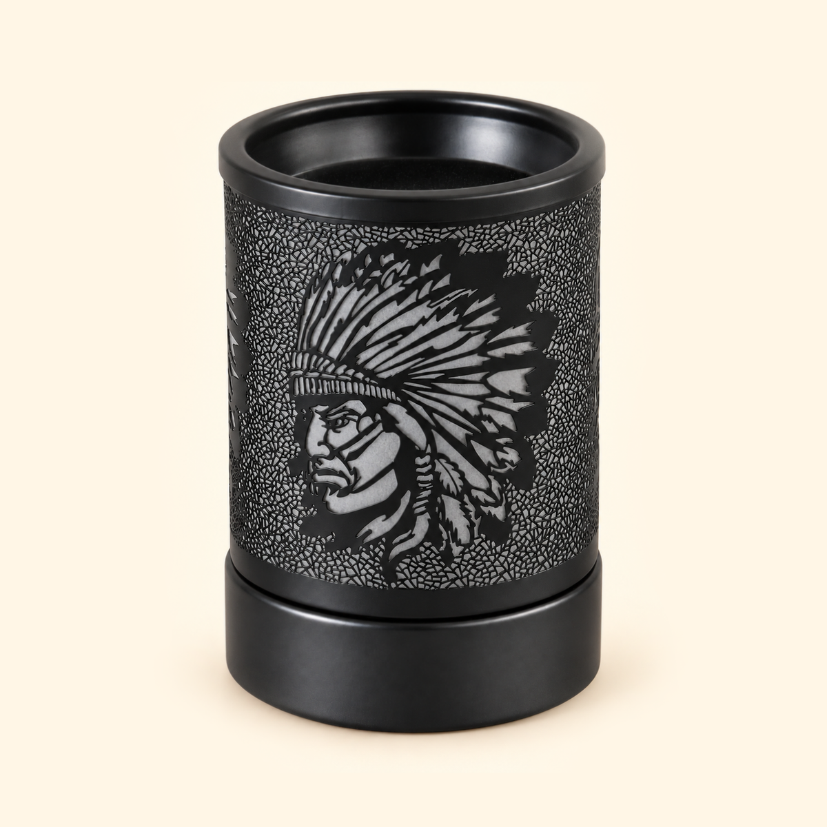 Unlit black electric wax warmer with a feathered headdress profile and intricate crackle-cut metal design.