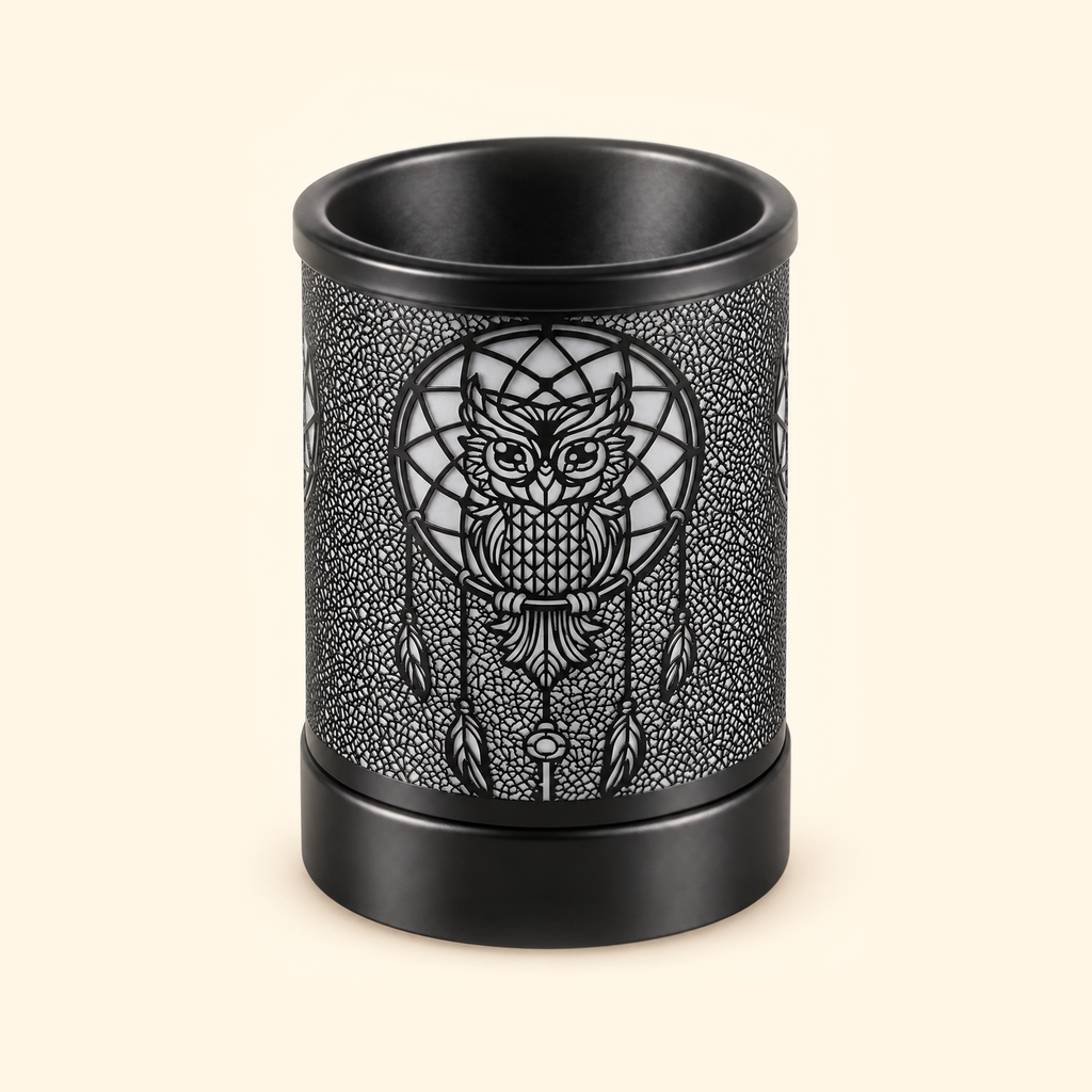 Unlit black electric wax warmer with an owl dreamcatcher and hanging feather design