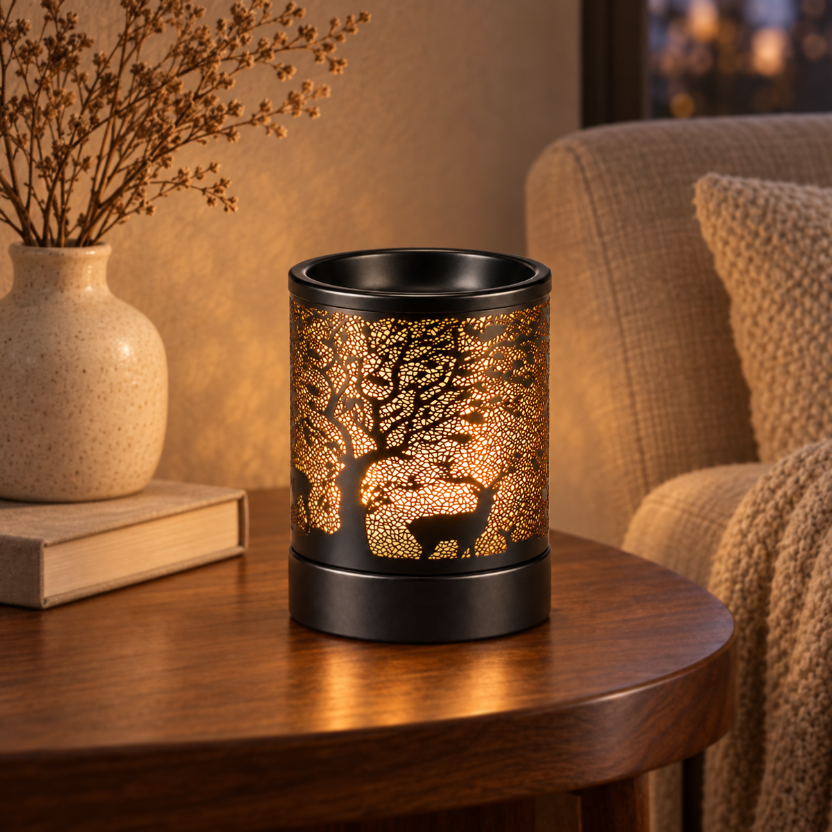 Amber glowing deer and tree wax warmer displayed on a wooden side table in a cozy living room.