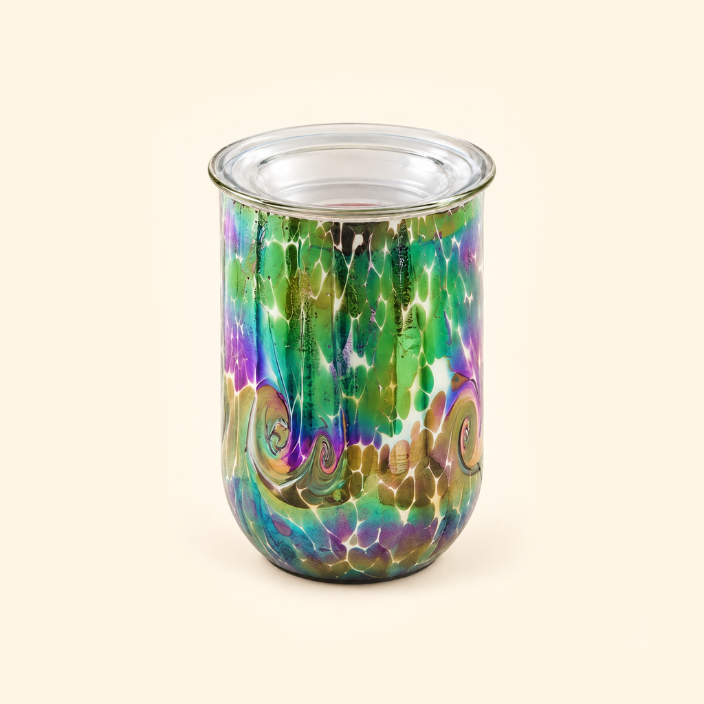 Multicolor Swirl glass illumination wax warmer switched off on a warm cream background.