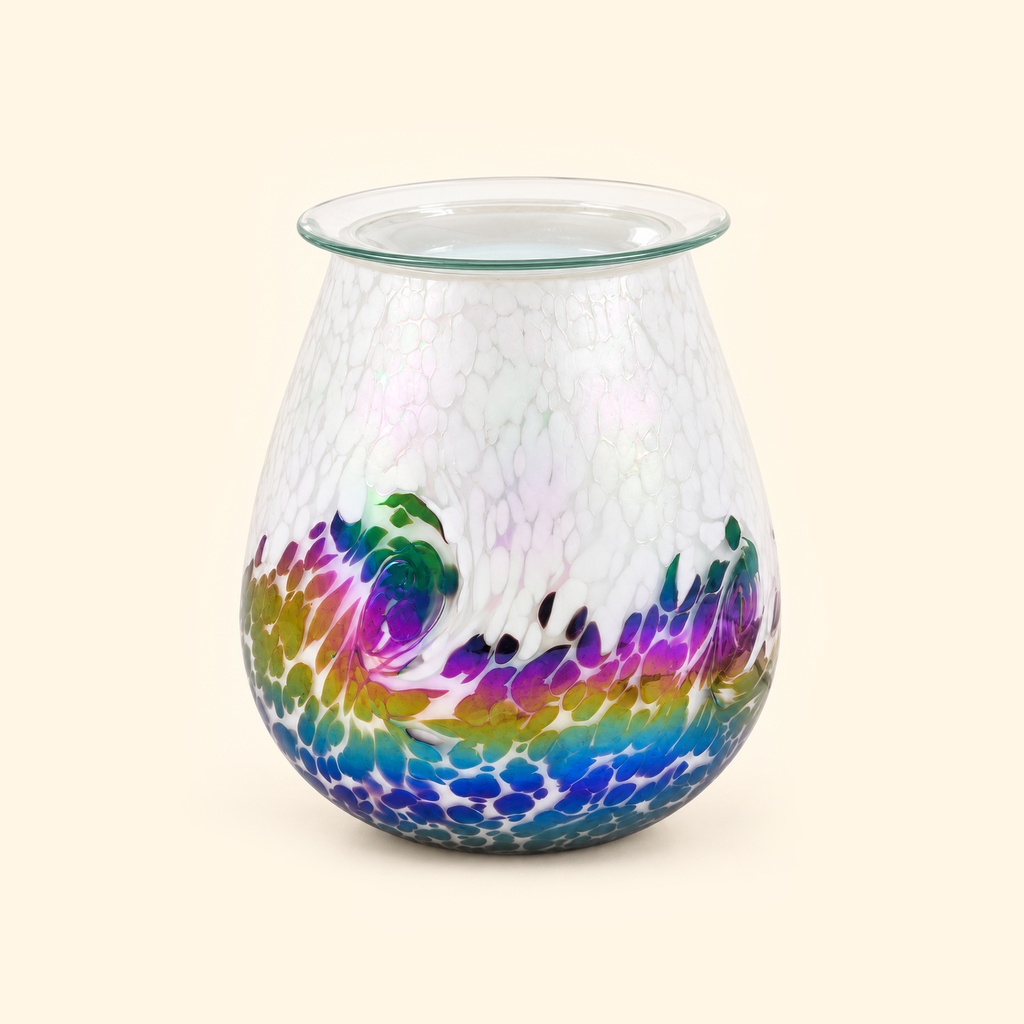 Prismatic Tide glass illumination wax warmer switched off on a warm cream background.
