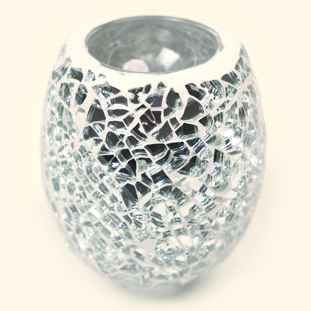 Close-up of the transparent crystal mosaic glass shade on the pluggable wax warmer.