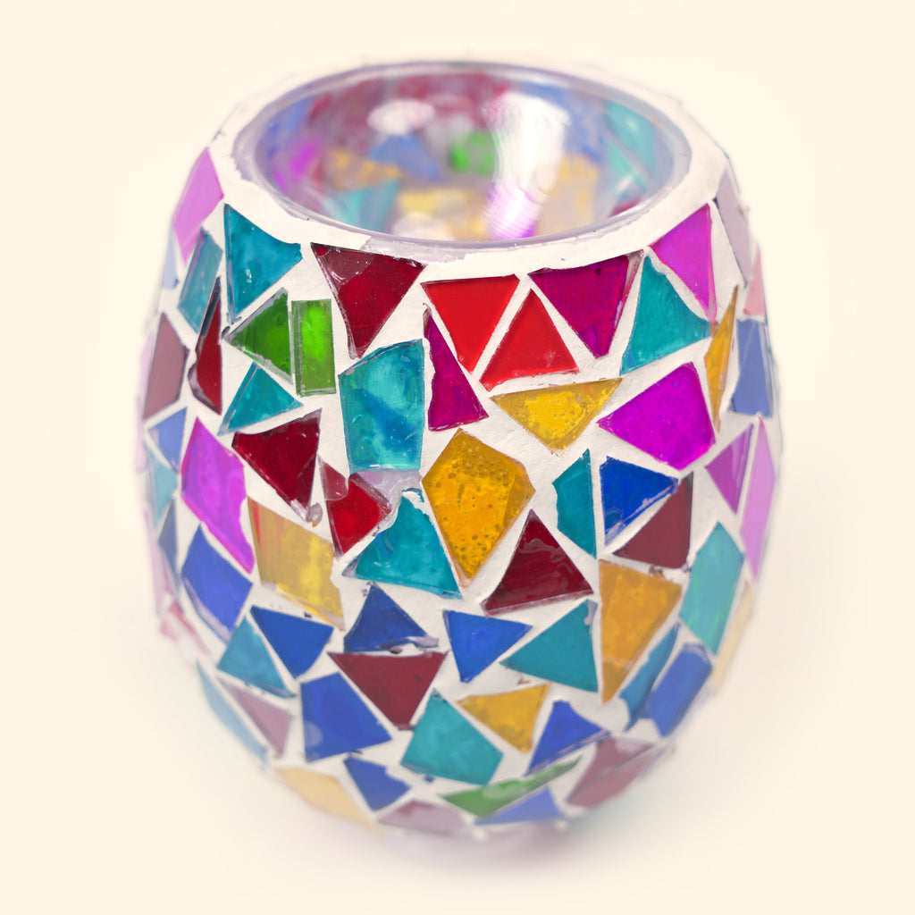 Close-up of the colorful geometric mosaic glass shade on the Kaleidoscope Mosaic Plug-In Wax Warmer.