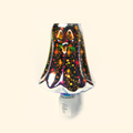 Iridescent Ghost Firework Pluggable Wax Warmer with iridescent ghost-shaped glass, front view.