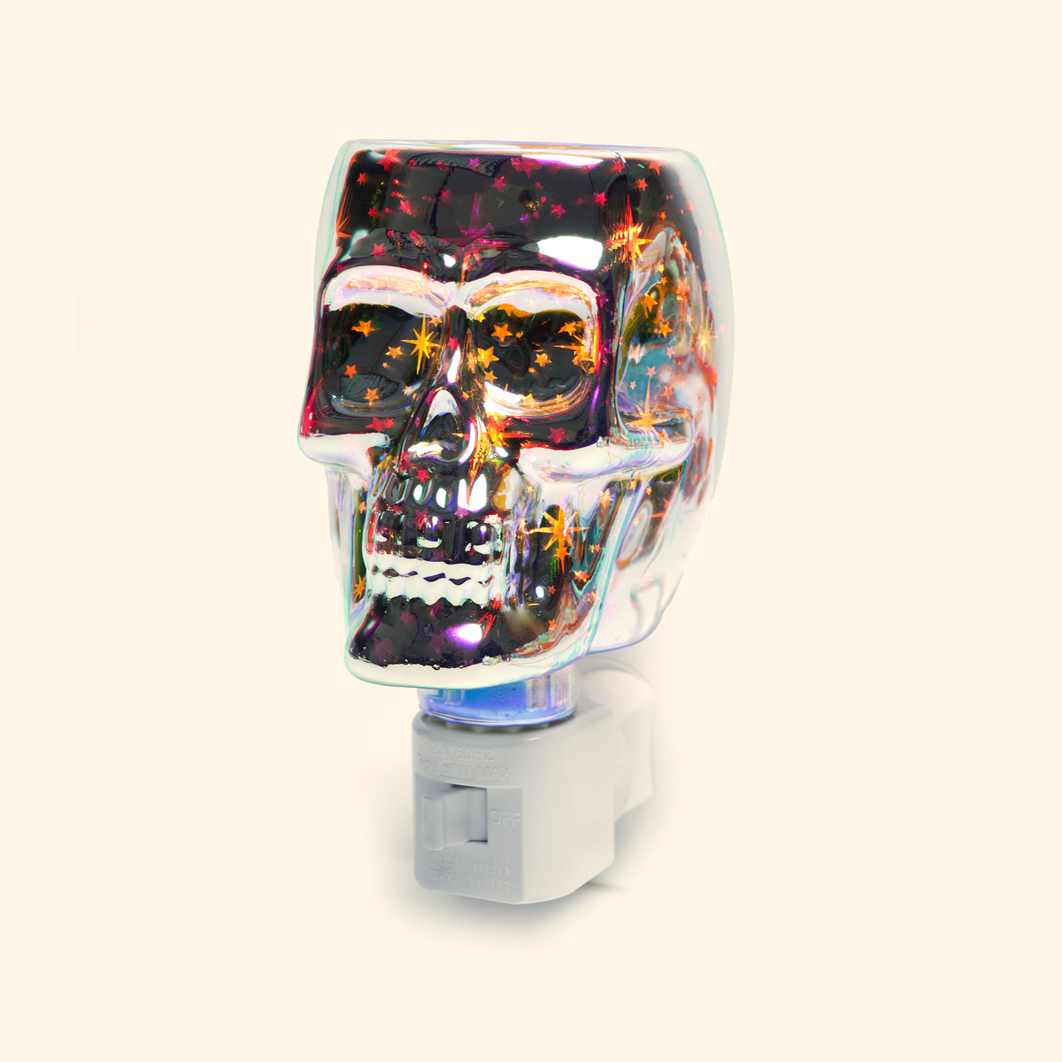 Iridescent Skull Pluggable Wax Warmer with iridescent glass and a glowing skull design, front view.