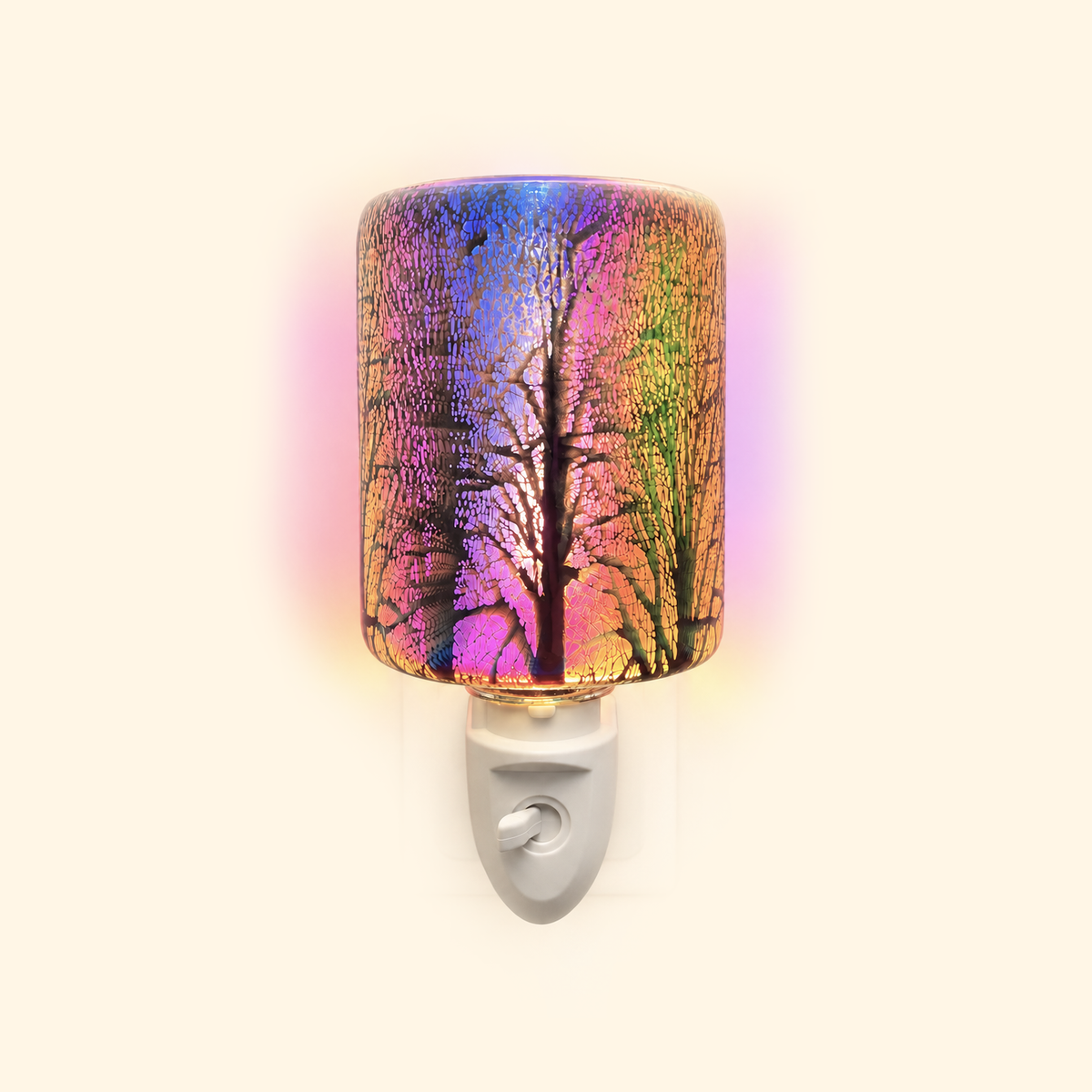 Front view of the Galaxy Firework Pluggable Wax Warmer glowing with multicolor light on a warm cream background