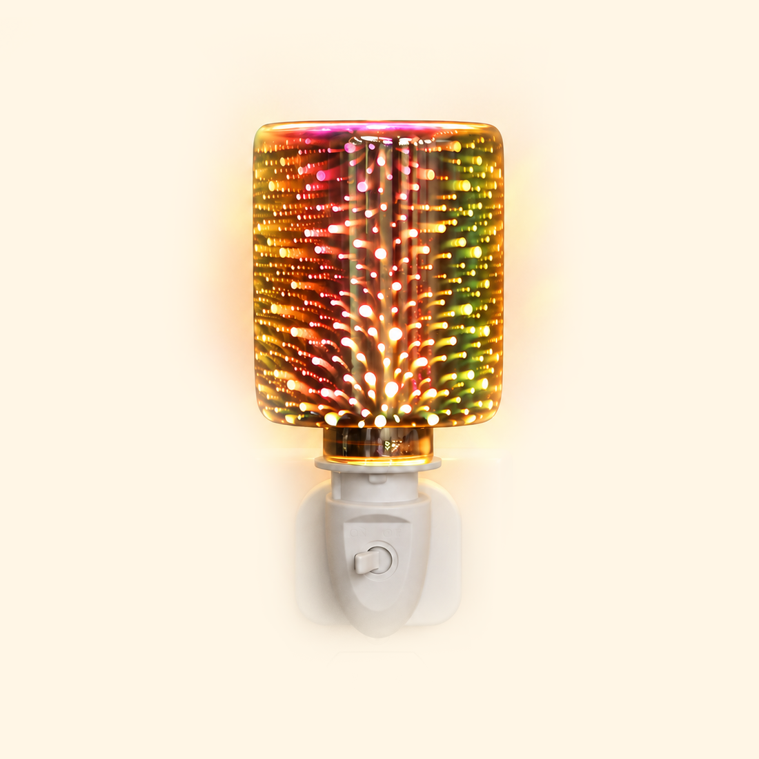 Front view of an iridescent firework glass pluggable wax warmer glowing on a warm cream background