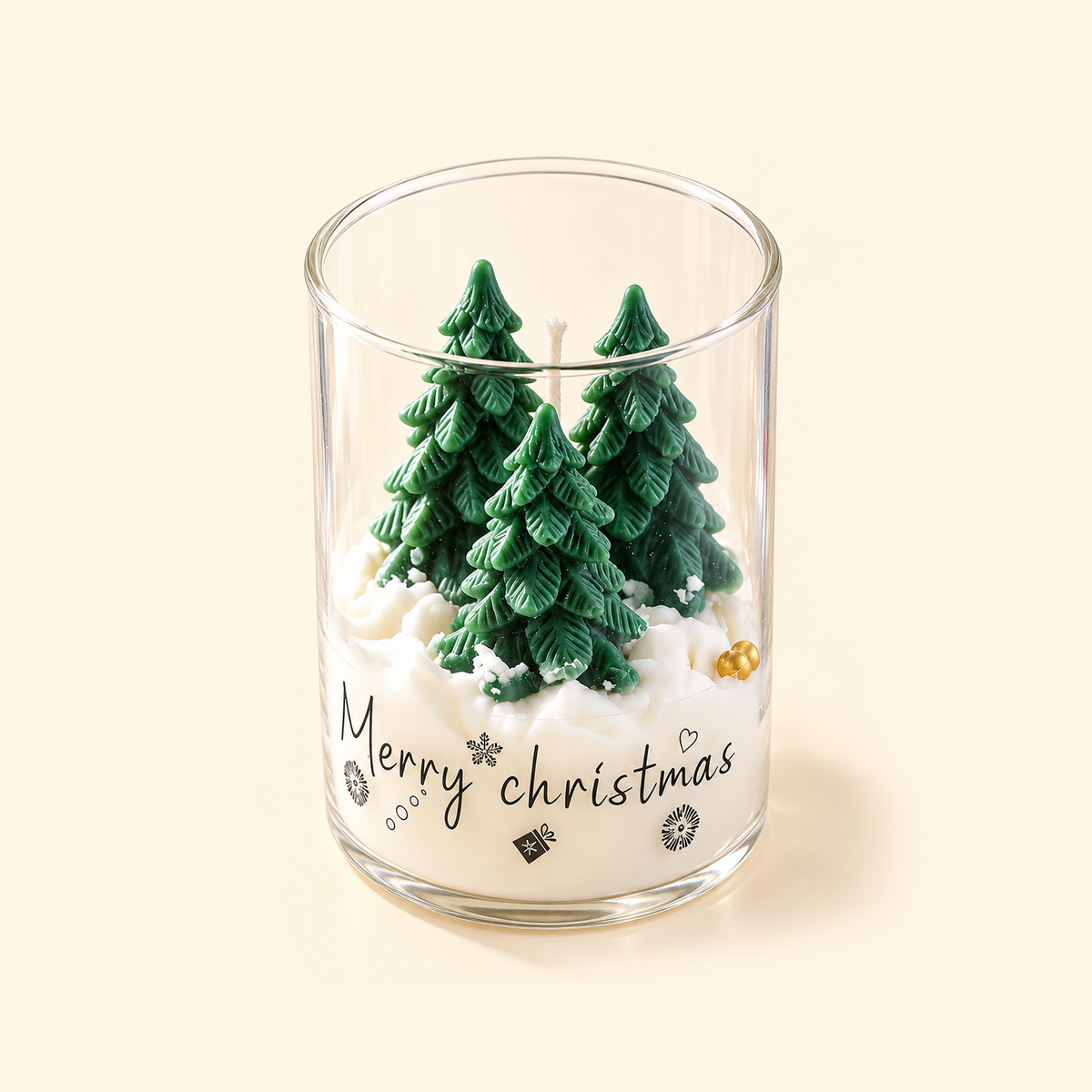 Angled top view of an open Christmas Tree Trio candle showing three green wax trees and an unlit wick.