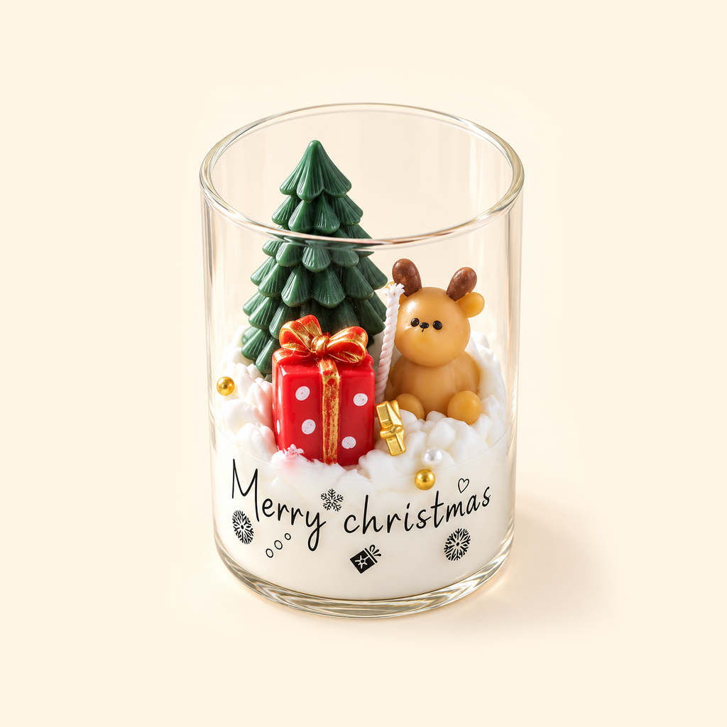 Angled top view of an open Christmas Teddy Bear candle with a tan bear, red and gold gift box and green tree.