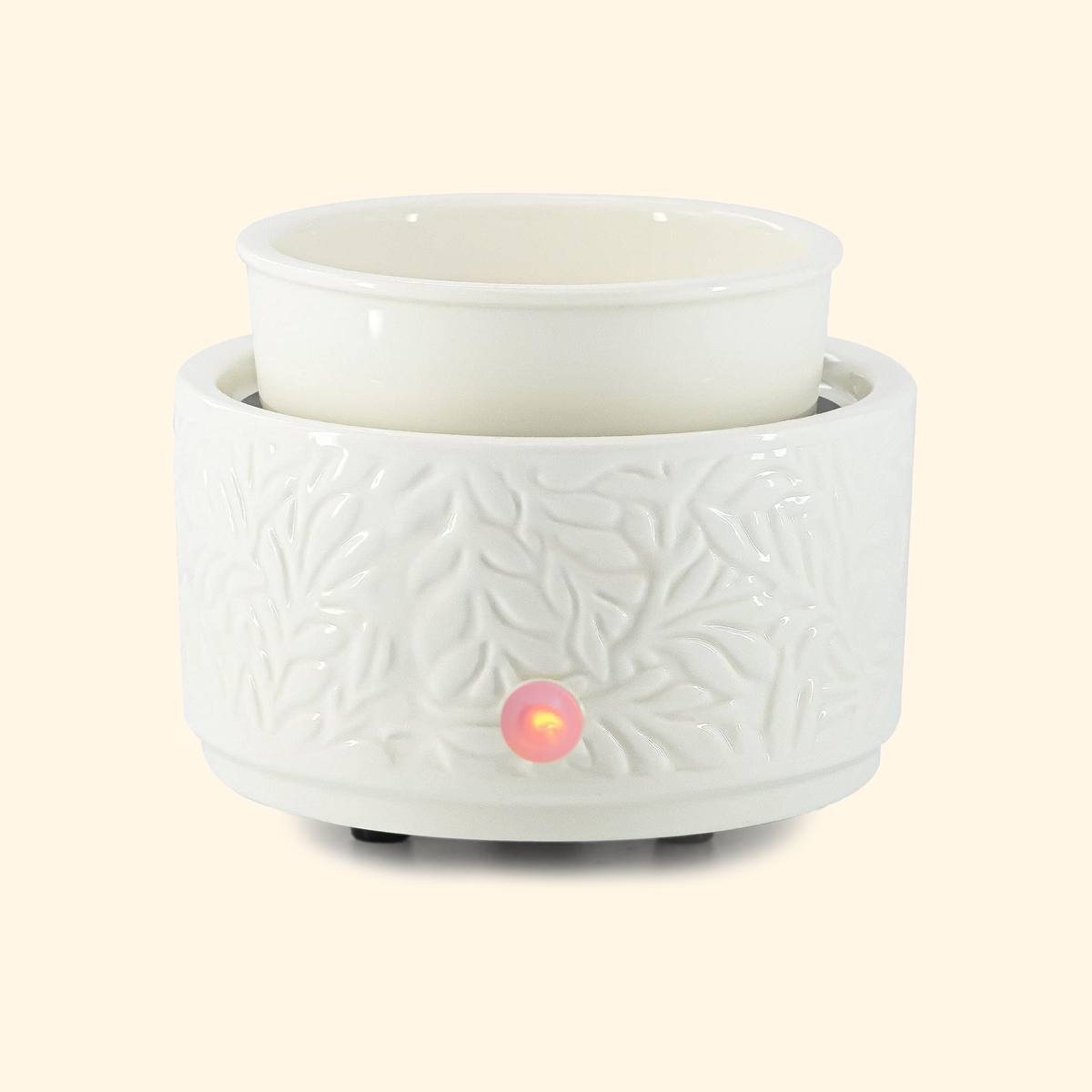 Front view of the Ivory Botanical ceramic wax warmer with empty dish and illuminated control indicator.