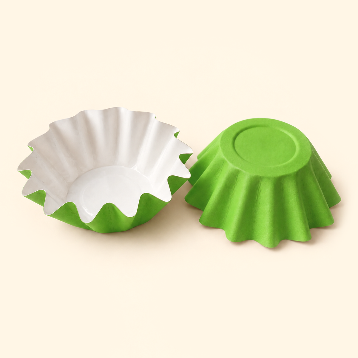 Bright green disposable wax melt liners with white interiors, shown open and upside down on a warm ivory background