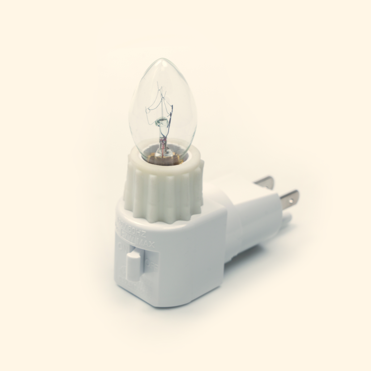 White plug base and bulb for the Pluggable Wax Warmer.